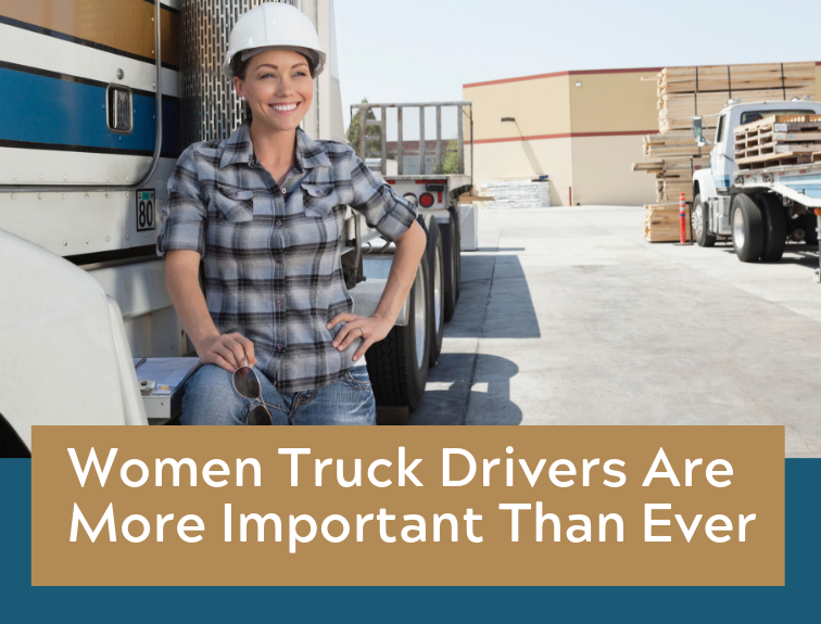 A woman truck driver standing next to a truck.